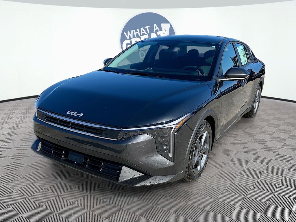 2026 Kia K4 LXS in Interstellar Gray — front three-quarter view