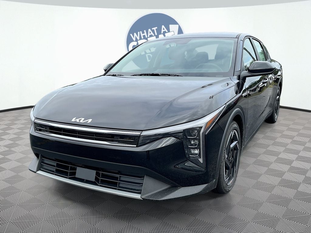 2026 Kia K4 EX in Aurora Black Pearl — front three-quarter view