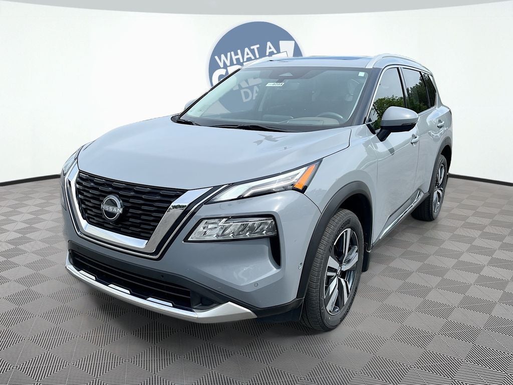 2023 Nissan Rogue Platinum in Boulder Gray Pearl — front three-quarter view