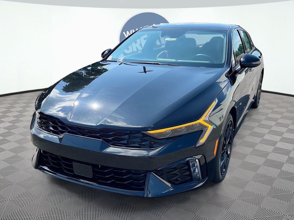 2026 Kia K5 GT-Line in Aurora Black Pearl — front three-quarter view