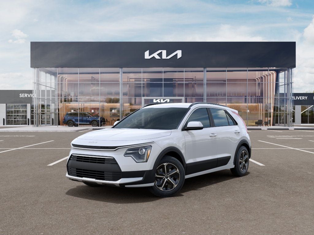 2026 Kia Niro LX in Snow White Pearl — front three-quarter view